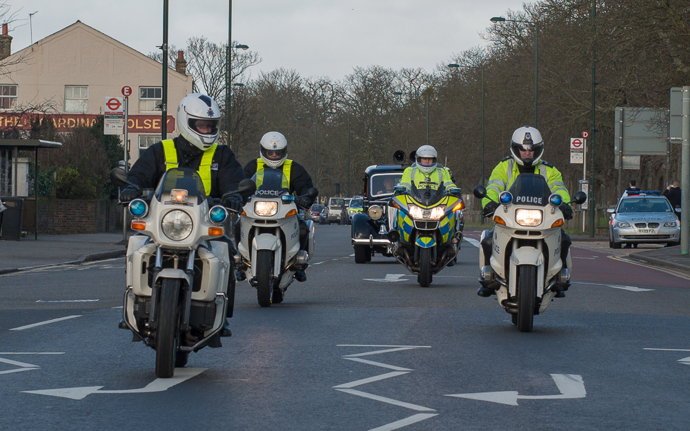 Vintage Police cars leaving Hampton