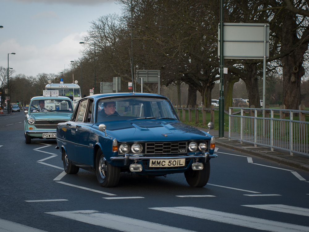 Vintage Police cars leaving Hampton
