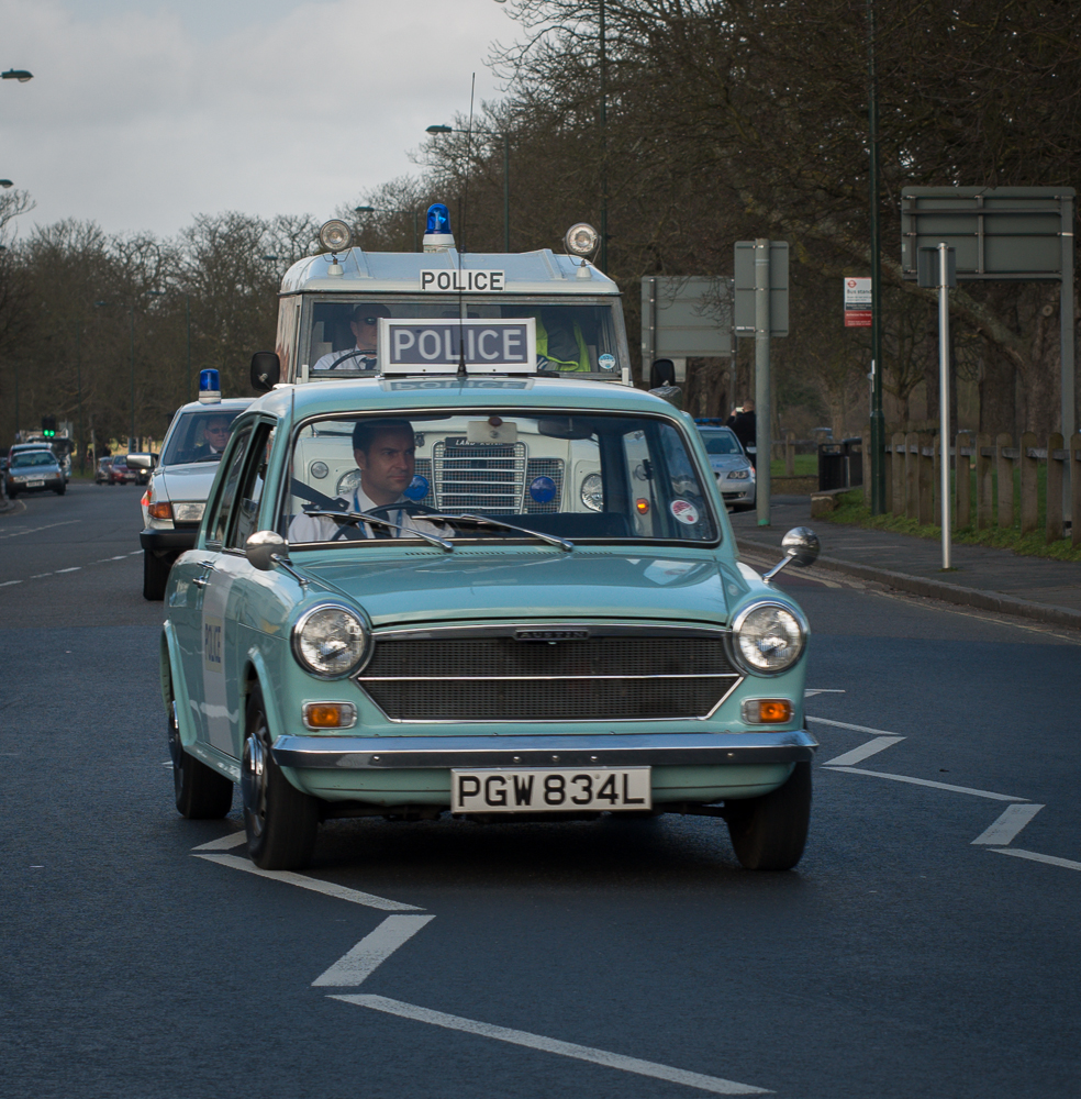 Vintage Police cars leaving Hampton